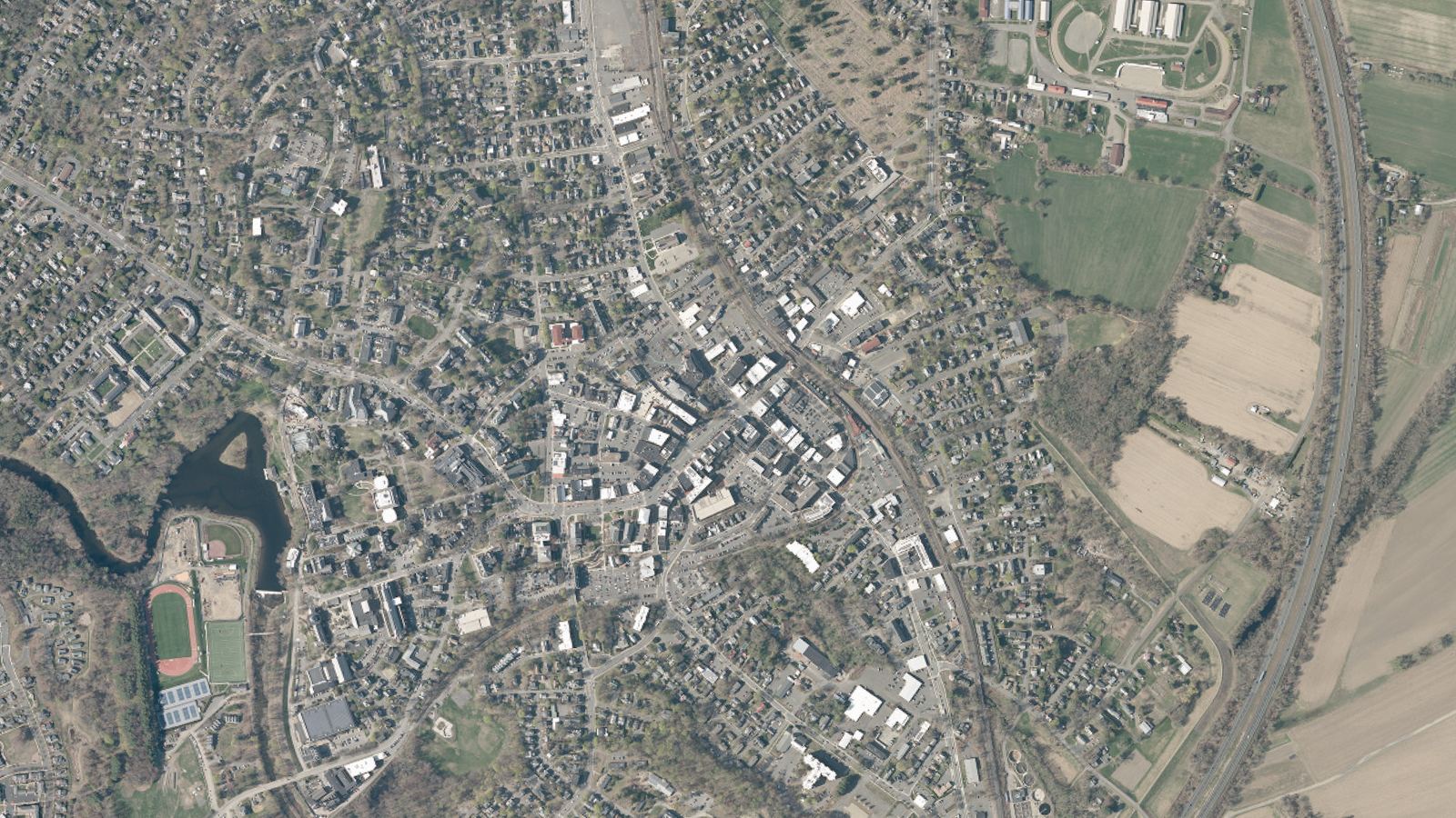 Aerial view of downtown Northampton and the Connecticut River valley farmland east of it